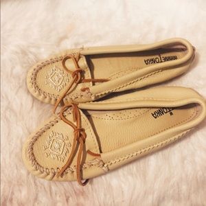 Never worn Minnetonka moccasins